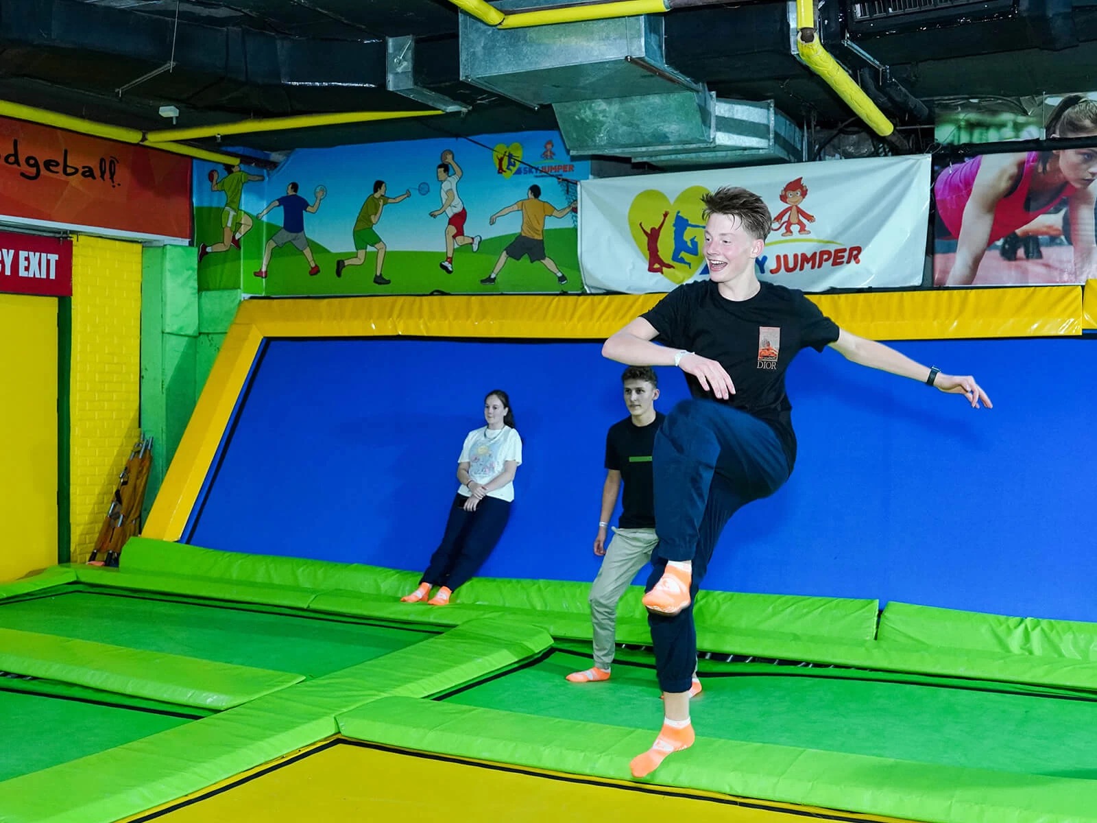 a guy dancing on trampoline