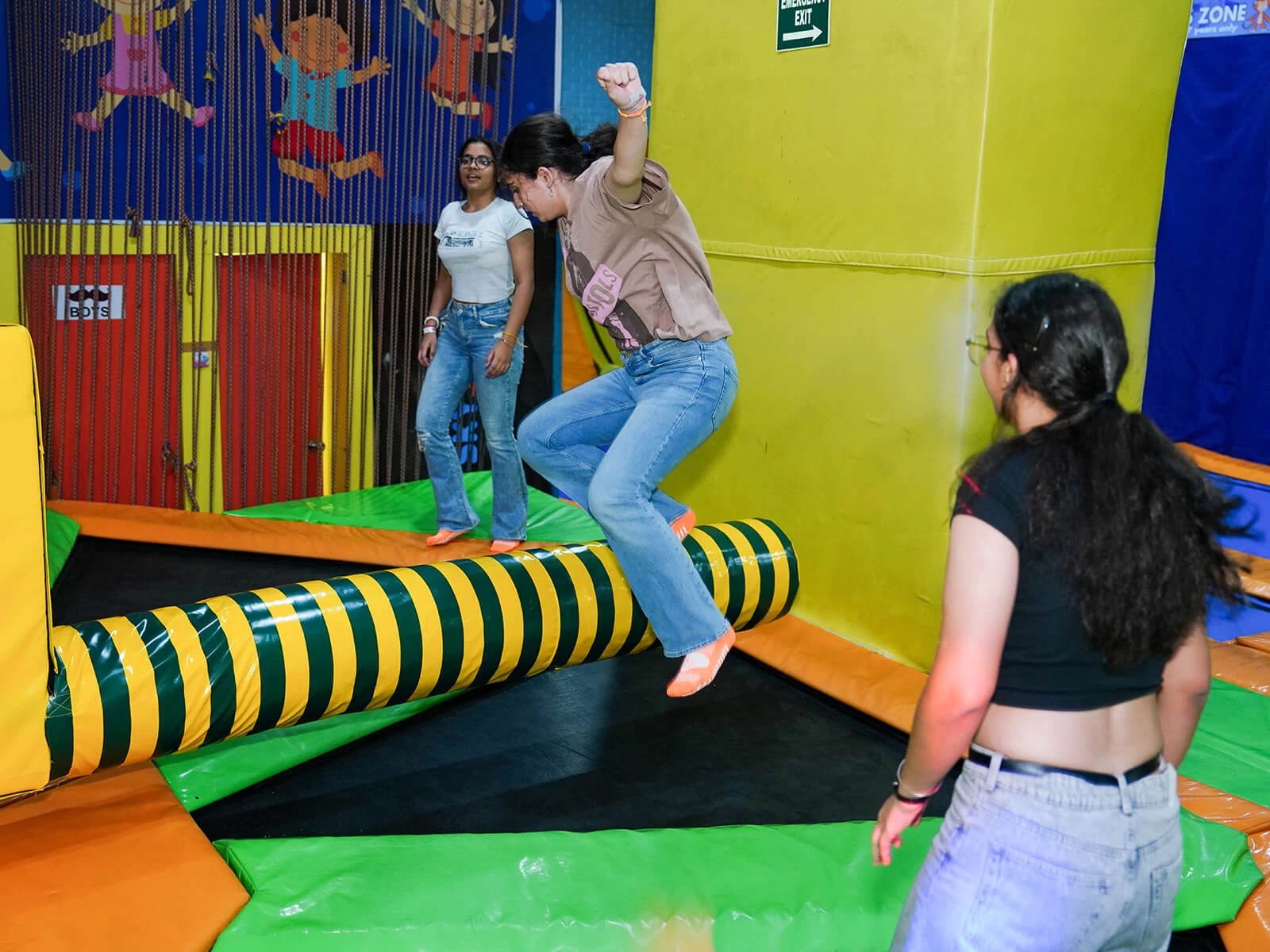 kids playing wipe out at skyjumper