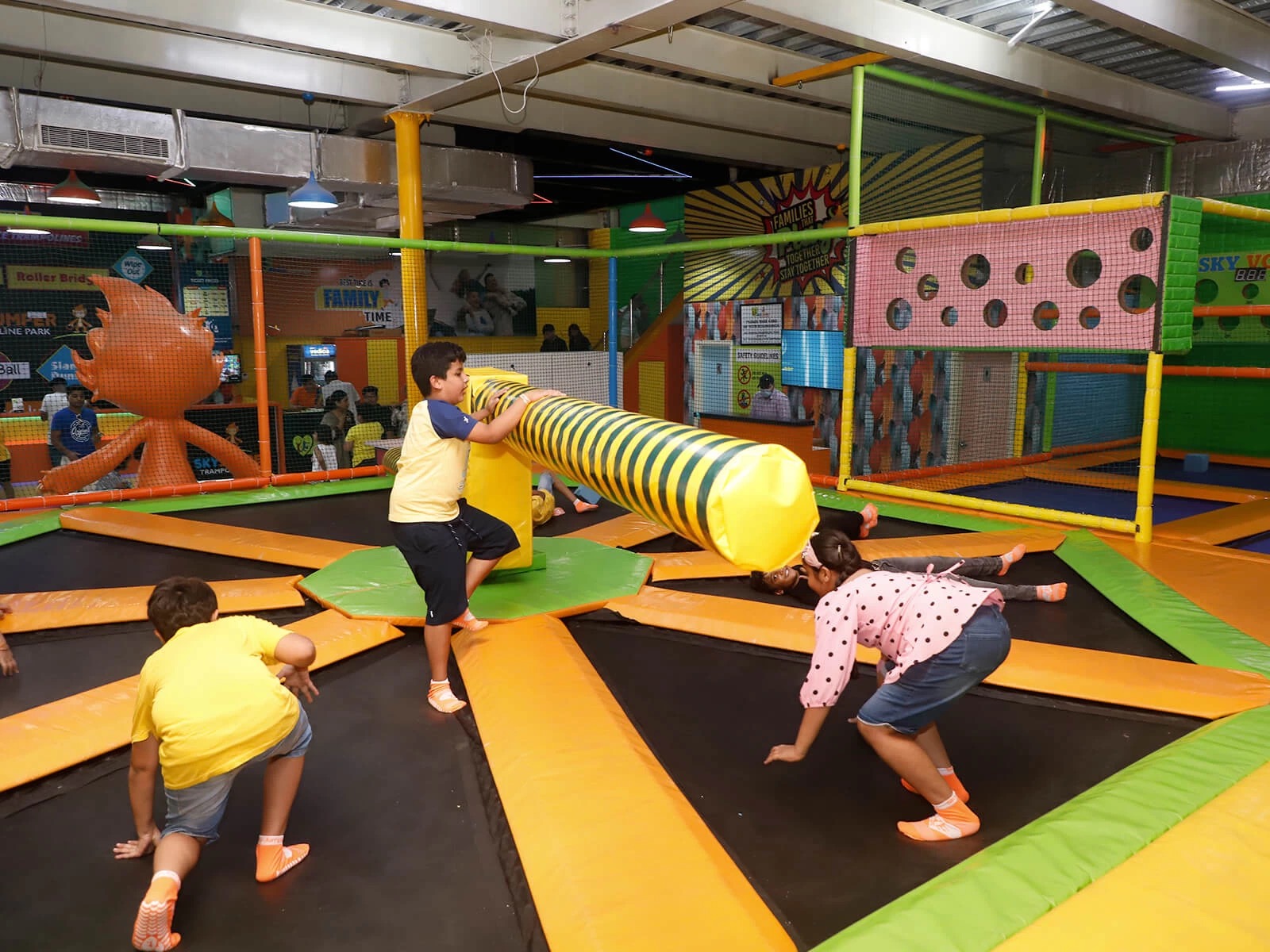 kids playing wipe out at skyjumper