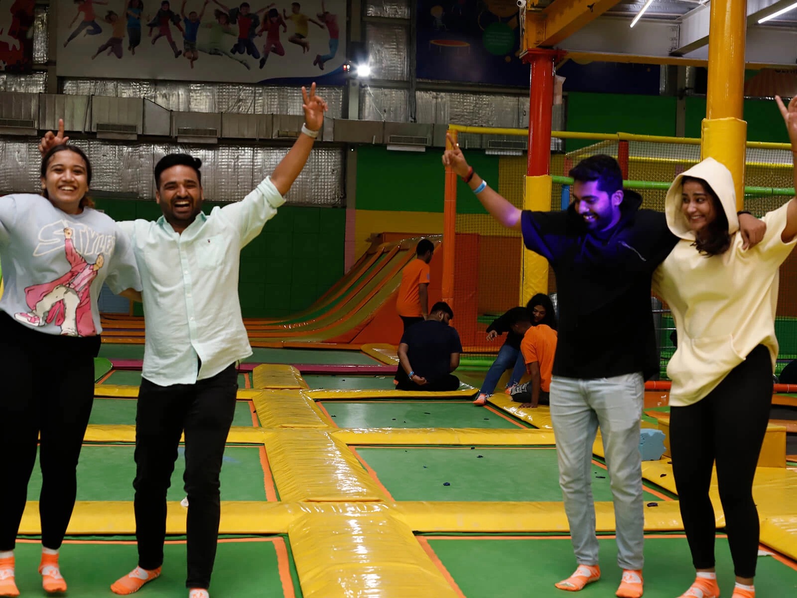 people having fun in trampoline arena