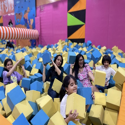 people enjoying in foam pit at skyjumper